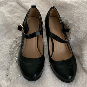 Office wear nice pair of black high heels size 8.5